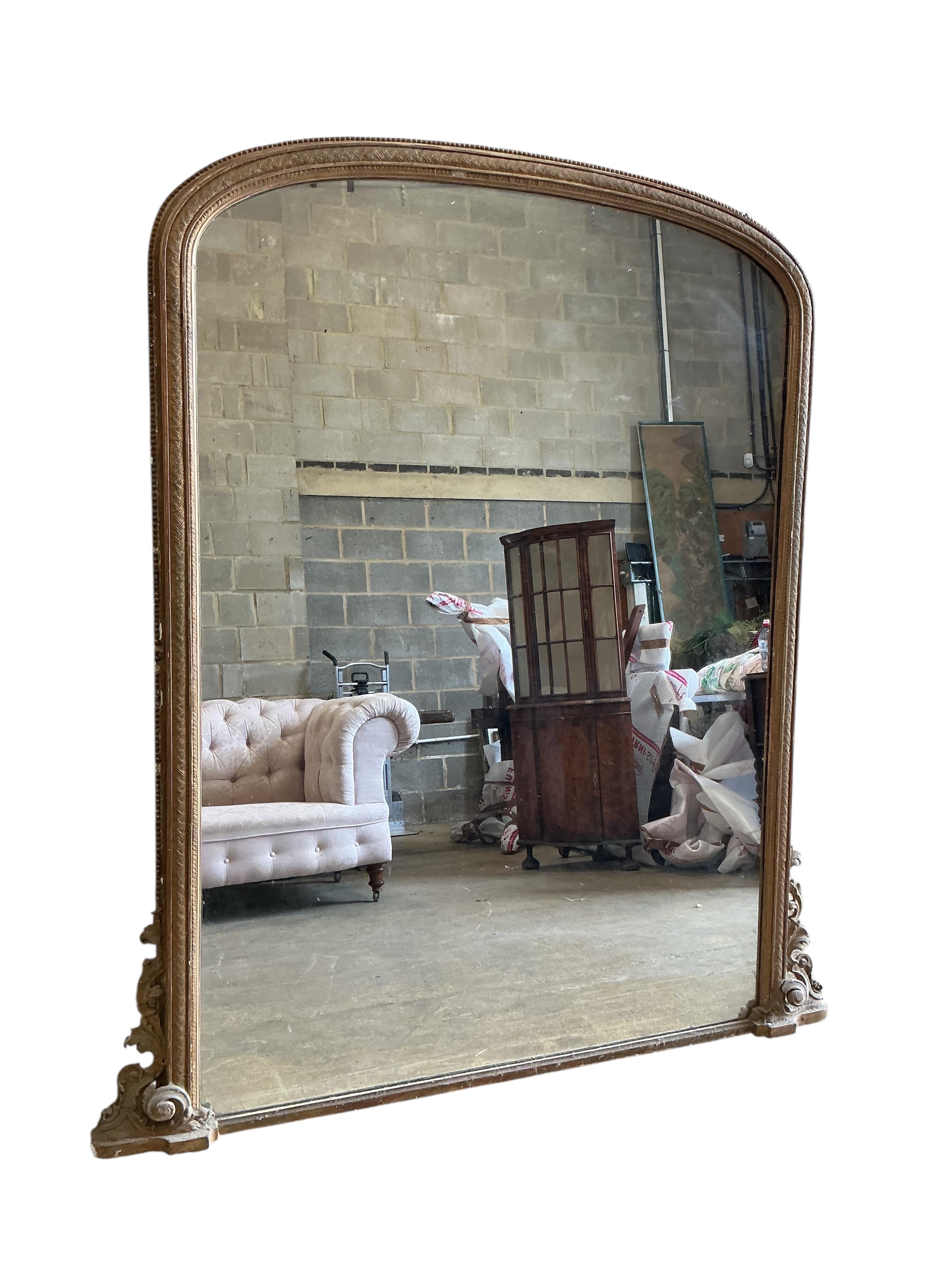 A large Victorian giltwood and composition overmantel mirror, width 160cm, height 184cm